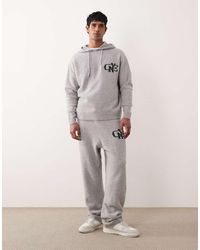 ASOS - Oversized Knitted Cuffed Trackies With Nyc Chest Logo - Lyst