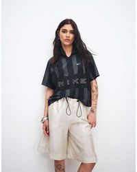 Nike - Camiseta Negra A Rayas De Punto Liso Street De - Lyst
