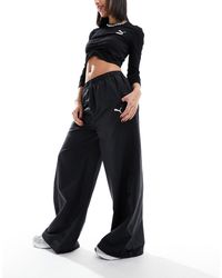 PUMA - Dare To Woven Parachute Pants - Lyst