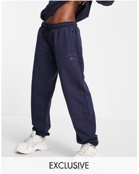 Pantalones de chándal y joggers Fila de mujer: hasta el 66 % de descuento |  Lyst