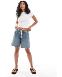 Hollister - Geborduurde Denim Baggy Short Met Lage Taille - Lyst