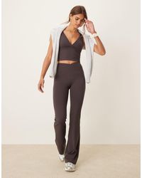 Tala - Dayflex Wrap High Waisted Flared Yoga Pant - Lyst