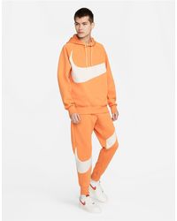 nike tech cuffed