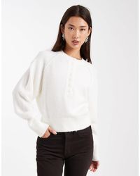 ASOS - Pull en maille à col boutonné et manches longues - crème - Lyst