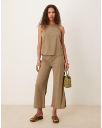 Mango - Broek Van Linnenmix Met Elastische Taille En Wijde Pijpen - Lyst