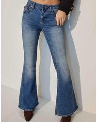 Stradivarius - D04 Low Rise Flared Jeans - Lyst