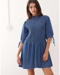 Reclaimed Vintage - Shirred Bodice Drop Waist Mini Denim Dress - Lyst
