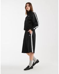 Fred Perry - Taped Logo Track Jorts - Lyst