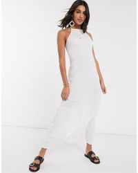 asos design premium broderie maxi dress with pep hem and fluted sleeves