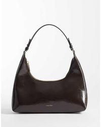 Calvin Klein - Foil Logo Glossy Shoulder Bag - Lyst