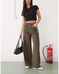 adidas Originals - Vaqueros De Pernera Ancha Con Estampado De Leopardo De - Lyst