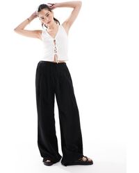 New Look - Top De Tirantes Con Lazadas Delanteras De Punto Liso De - Lyst
