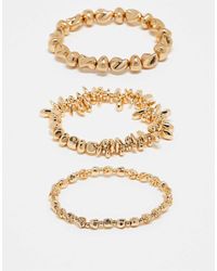 Accessorize - Confezione Da 3 Bracciali Rigidi Dorati Elasticizzati A Forma Di Coralli - Lyst