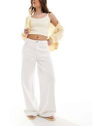 Bershka - Baggy Jeans Met Wijde Pijpen En Hoge Taille - Lyst