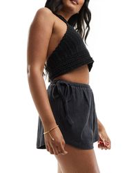 ASOS - Textured Tie Side High Low Shorts - Lyst