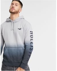 white and blue hollister hoodie