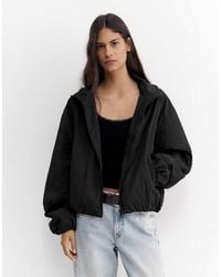 Pull&Bear - Giacca Leggera Nera Con Cappuccio - Lyst