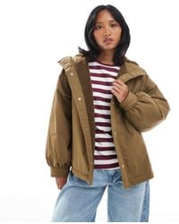 ASOS - Asos design petite - veste imperméable oversize avec doublure en polaire - olive - Lyst