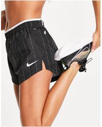 Nike - Icon clash dri-fit tempo luxe - pantaloncini neri - Lyst