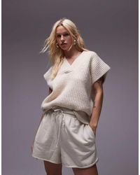 TOPSHOP - Chaleco Holgado Con Cuello De Pico De Punto Acanalado Mullido De -Beis Neutro - Lyst