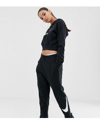 Nike Zwarte joggingboek Met Groot Swoosh-logo