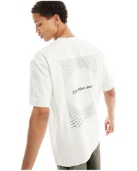 Calvin Klein - Square frequency - t-shirt chiaro con logo - Lyst