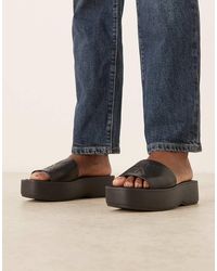 Calvin Klein - Jeans Monogram Flatform Leather Sandal - Lyst