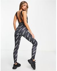 adidas Originals - Logomania Repeat Logo Catsuit With Strappy Back - Lyst