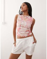 Reclaimed (vintage) - Camiseta Sin Mangas Con Cuello Barco Y Estampado Floral Con Adornos De Punto De - Lyst