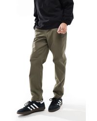 ASOS - Pantalones Chinos Caquis De Corte Tapered Sin Cierres Con Cinturilla Elástica De -Verde - Lyst