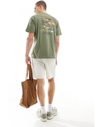 Carhartt - T-shirt con stampa di pesce sul retro - Lyst