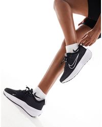 Nike - Interact run - sneakers bianche e nere - Lyst