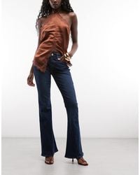 TRUE RELIGION - Joey Mid Rise Flap Pocket Flare Jeans - Lyst