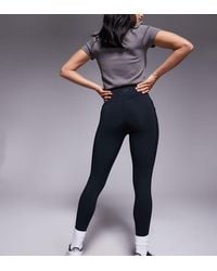 4505 - Petite Icon Active Tie Waist Run Legging With Phone Pocket - Lyst