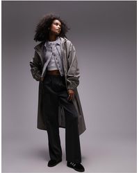 TOPSHOP - Rubberized Rain Trench - Lyst