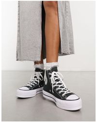 Converse – Chuck Taylor – Hohe Sneaker mit dicker Sohle in Weiß | Lyst DE