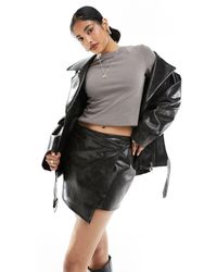 Weekday - Pam Faux Leather Cross Front Mini Skirt - Lyst
