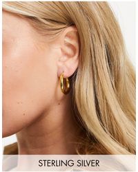 ASOS Gold Plated Sterling Silver Reverse Hoop Earrings in Black | Lyst