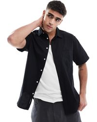 Vans - Lawson - chemise tissée unie à manches courtes - Lyst