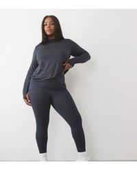 4505 - Curve Icon Active Tie Waist Run legging With Phone Pocket - Lyst