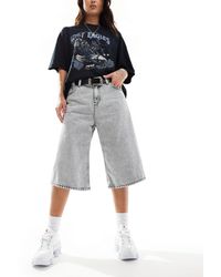Monki - Paige - jupe culotte ample en jean à taille basse - délavé - Lyst