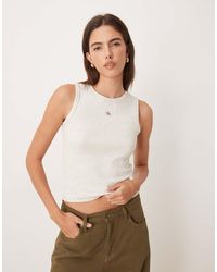 Calvin Klein - Top Gris Sin Mangas Con Logo De Monograma De Canalé De Algodón De - Lyst