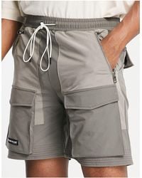 The Couture Club - Pantalones cortos es cargo con diseño - Lyst