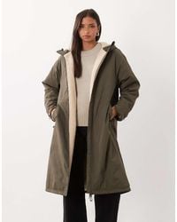 ASOS - Longline Rain Coat With Borg Liner - Lyst