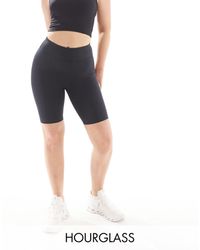 4505 - Hourglass Icon 8 Inch Legging Short With Bum Sculpt Detail - Lyst