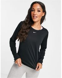 Nike - One Dri-fit - T-shirt Met Lange Mouwen - Lyst