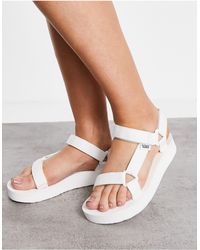 Sandalias negras con suela gruesa midform universal Teva de color Negro |  Lyst