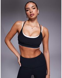 4505 - Micro Rib Light Support Strappy Sports Bra With Removeable Padding - Lyst