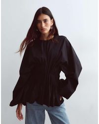 ARRANGE - Volume Sleeve Pleated Cinched Waist Top - Lyst