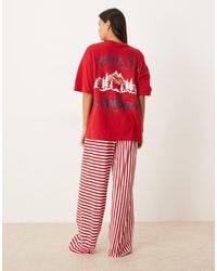 ASOS - Pijama De Pantalones De Pernera Ancha Y Camiseta Extragrande Con Estampado "Après Ski" De - Lyst